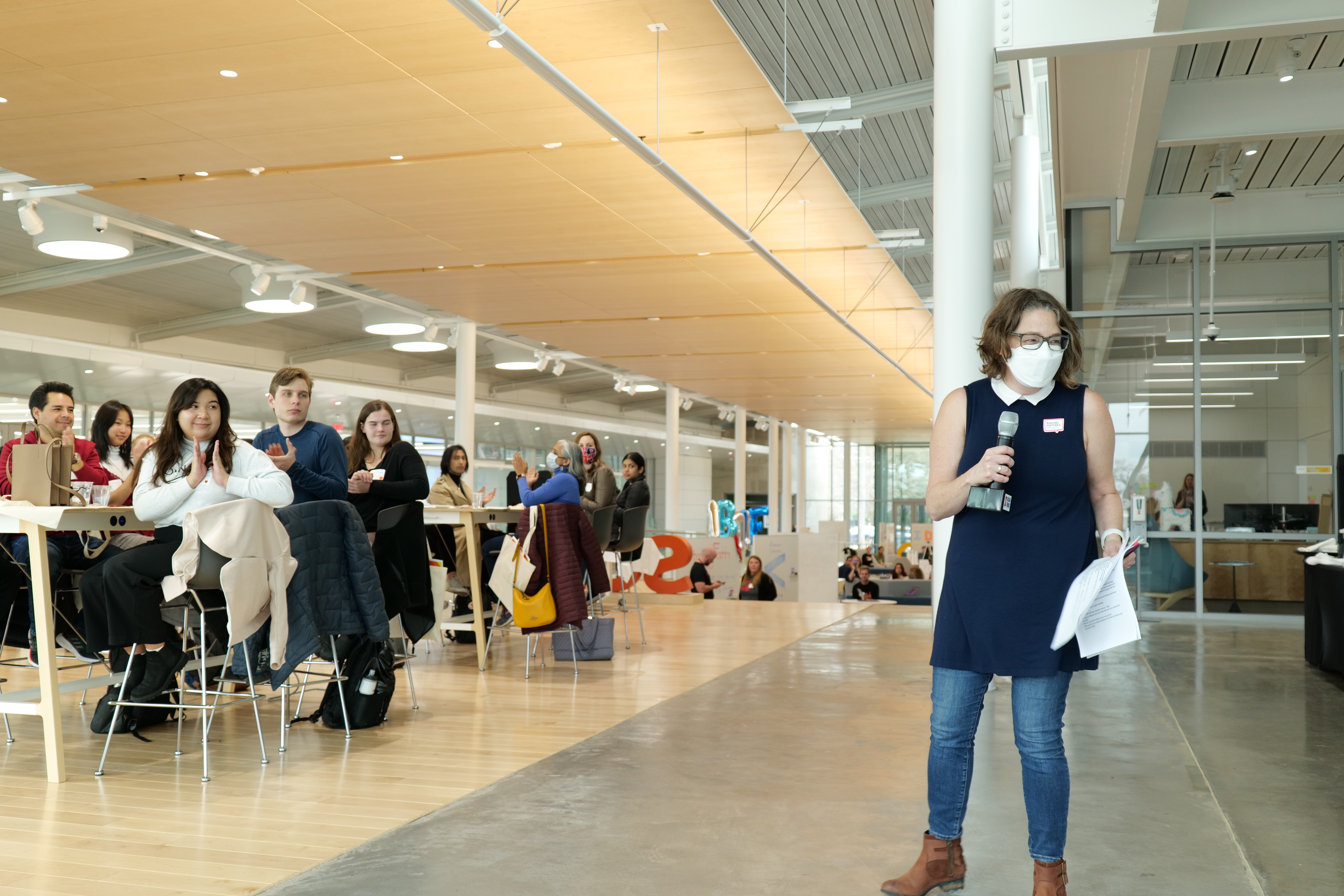 Rachel Switzky welcomes students to UX Day at SCD. Photo by by Sidney Rodriguez.